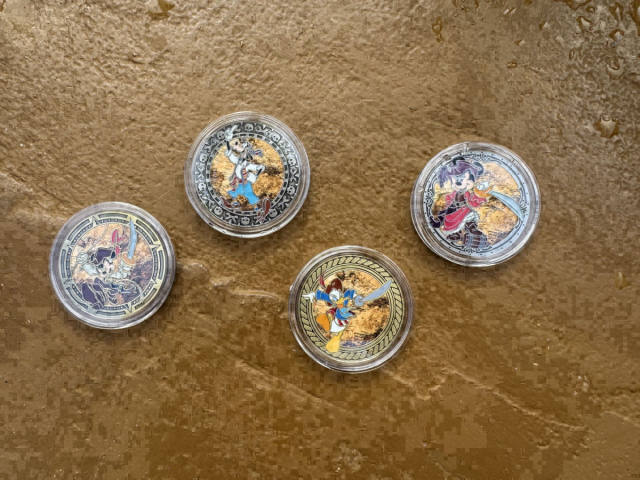 Colorful Pirates of the Caribbean Medallions Land at Magic Kingdom