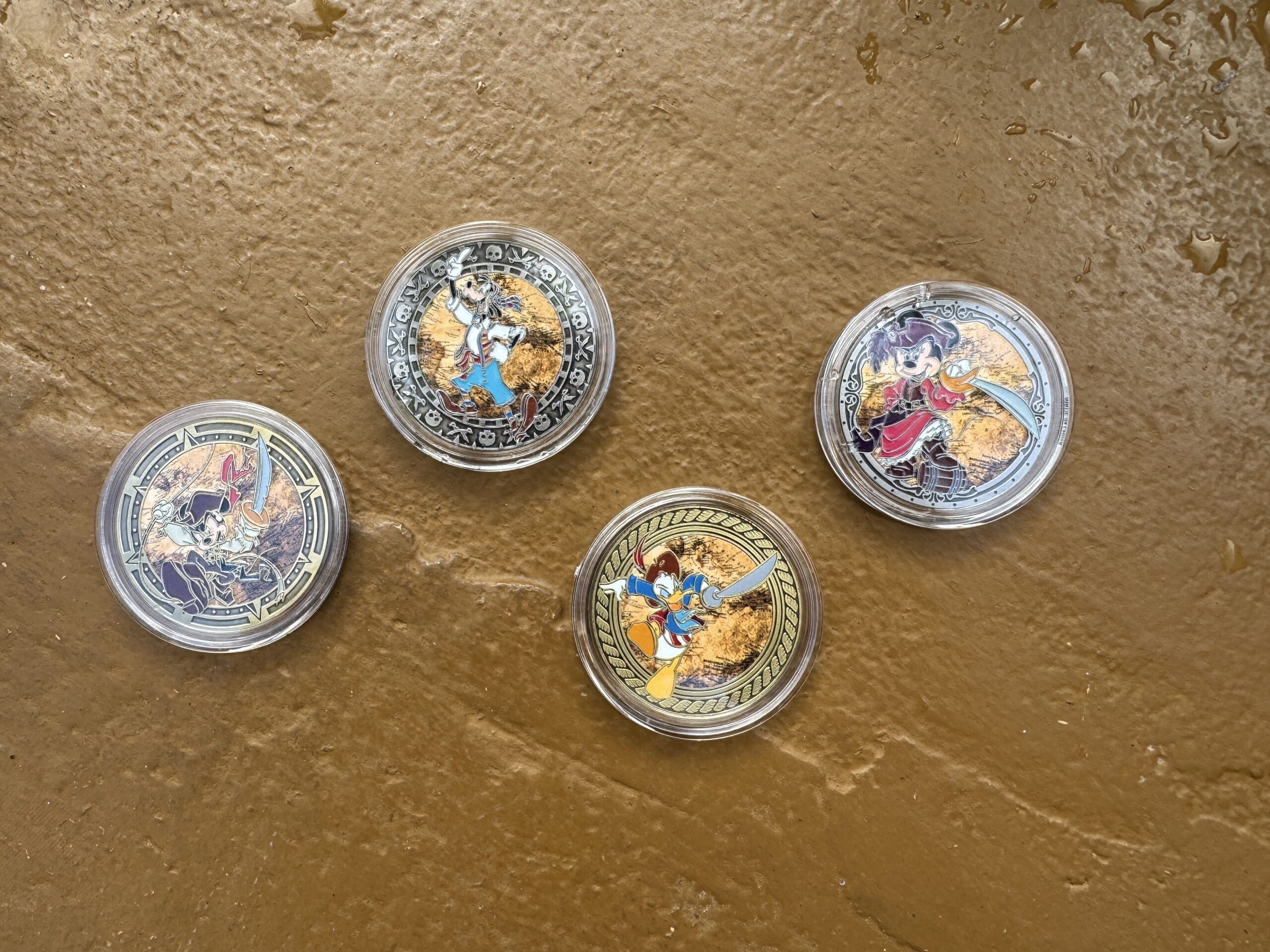 Colorful Pirates of the Caribbean Medallions Land at Magic Kingdom