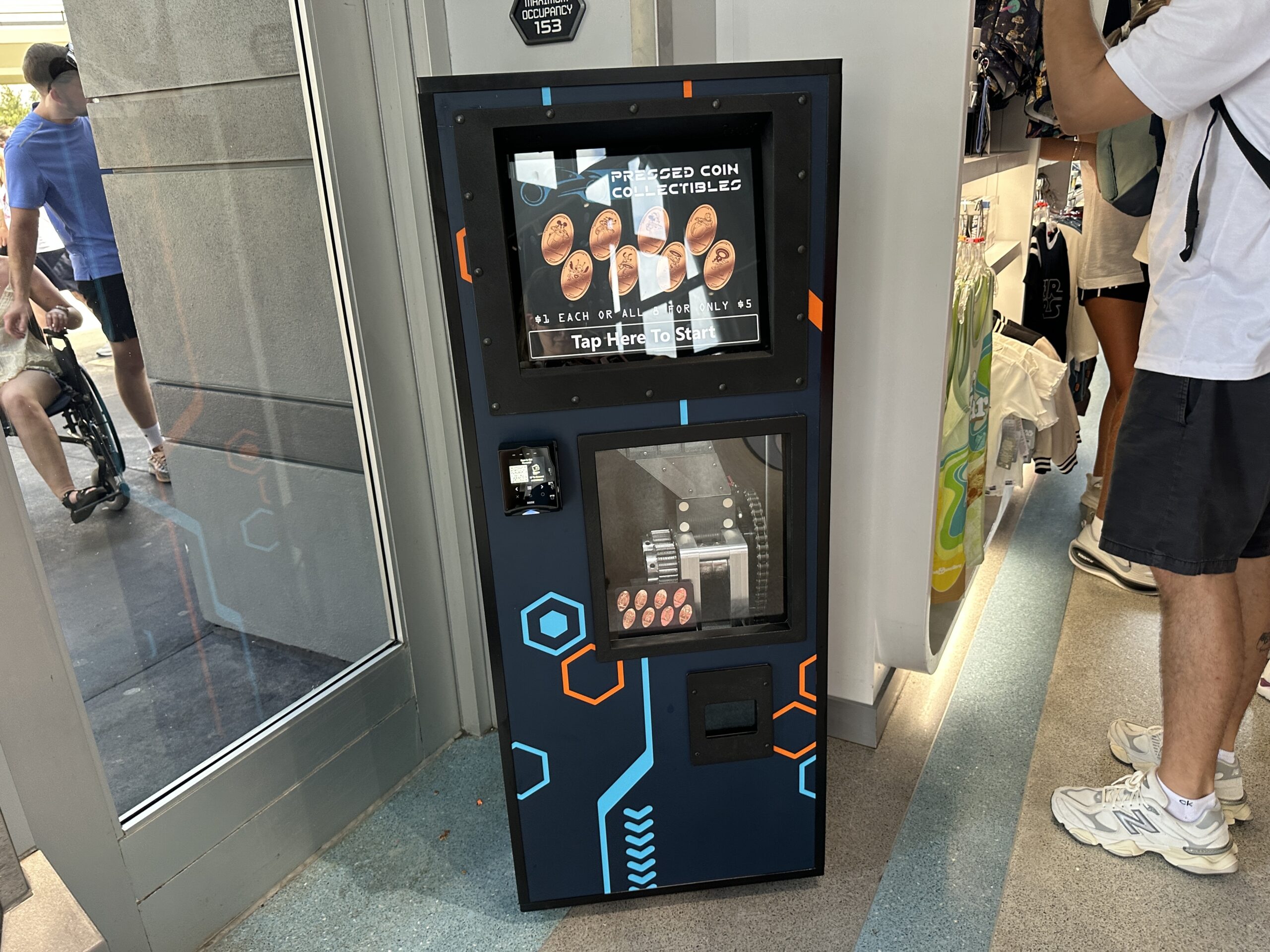TRON Pressed Penny Machine Rolls Into Magic Kingdom